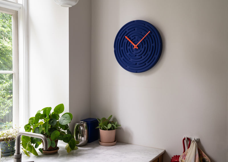 raawii Manon Novelli - Minos - wall clock Clock Horizon blue/traffic orange